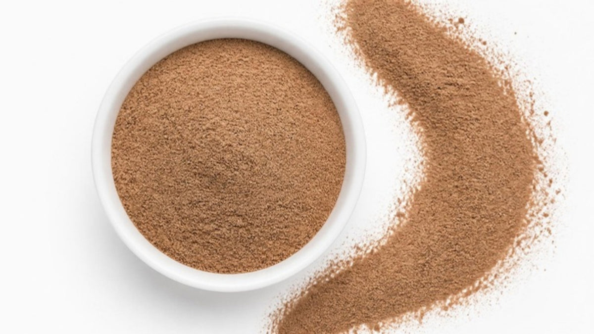 Chai latte powder in a white bowl